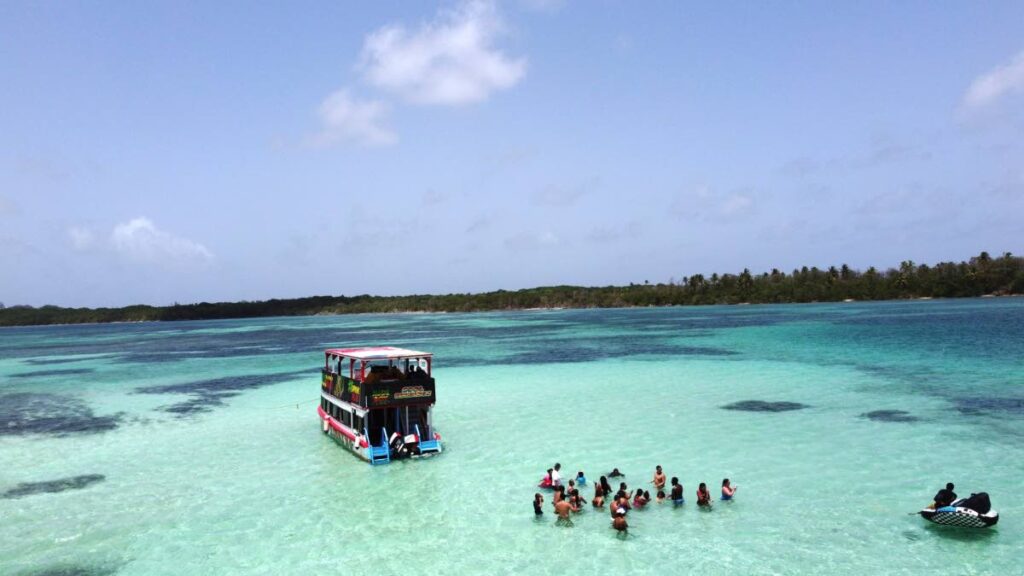 Cool Runnings, a glass-bottom boat, offers tours to the Buccoo Reef, including the Nylon Pool. - 