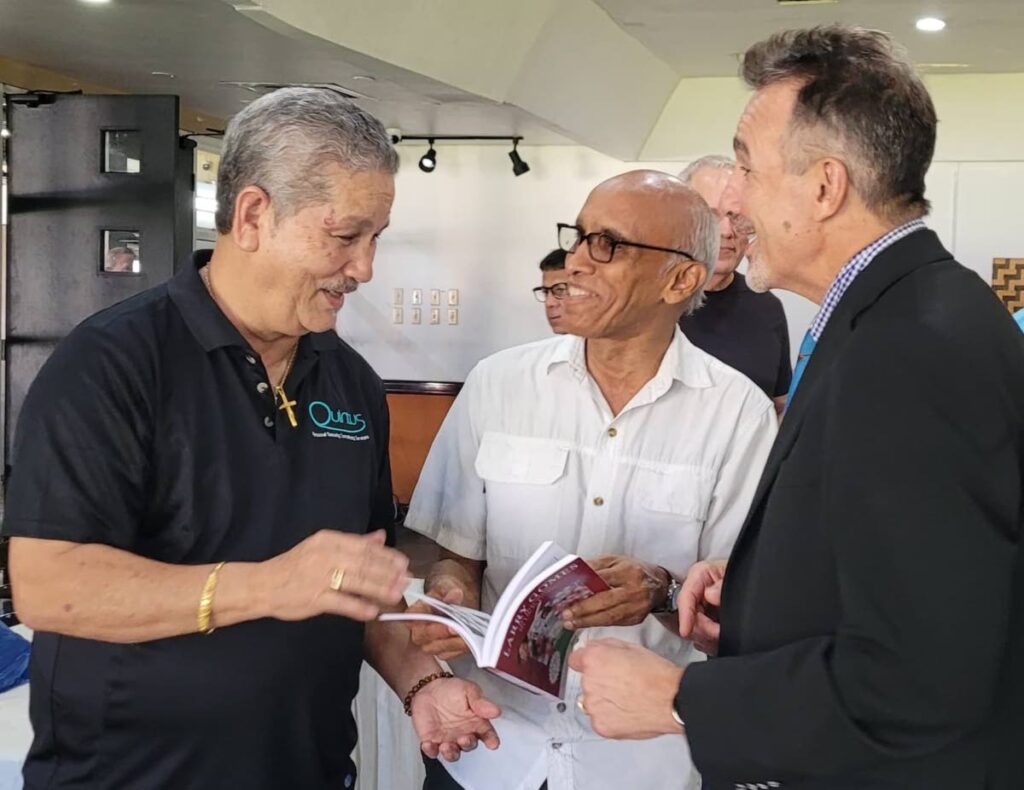 From left, former West Indies cricketer Larry Gomes, author Nasser Khan and Queen’s Park Cricket Club president Dr Nigel Camacho. -