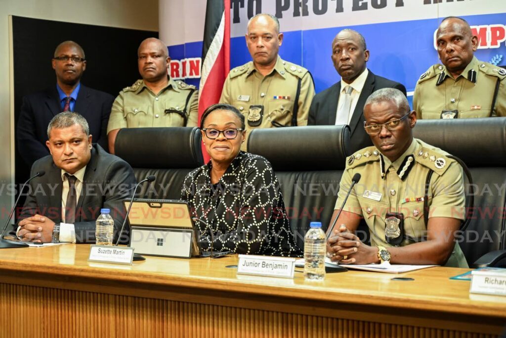 ERLA-LESS EXECUTIVE: Seated from left, legal officer Cpl Zaheer Ali, DCP Suzette Martin and DCP Junior Benjamin are flanked by members of the TTPS executive during a press conference on Friday at Police Administration Building in Port of Spain. Missing was police commissioner Erla Harewood-Christopher who remains under arrest.  - 