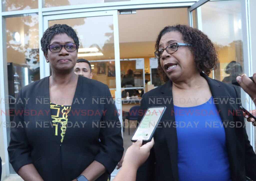 Commissioner of Police Erla Harewood-Christopher, left, and her attorney, Pamela Elder, SC, at the St Clair Police Station after the commissioner's relase on February 1. - Photo by Angelo Marcelle