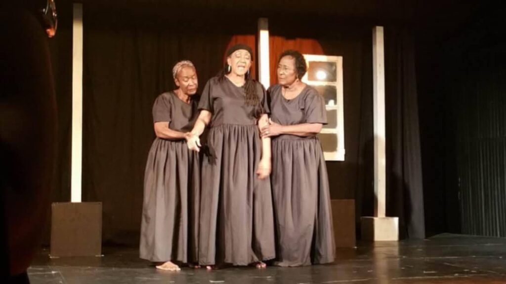 From left: Eintou Pearl Springer, Mavis John and Eunice Alleyne perform in Springer’s play Shades of I-She. - Photo courtesy the Idakeda Group.  