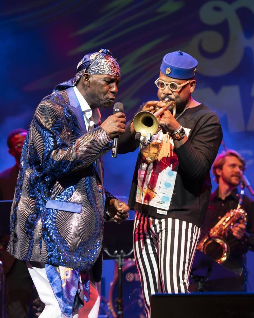 SuperBlue and musician Etienne Charles perform during The Road March in Concert II on February 6 at Queen's Hall, St Ann's. The concert honoured SuperBlue. - Photo by Maria Nunes