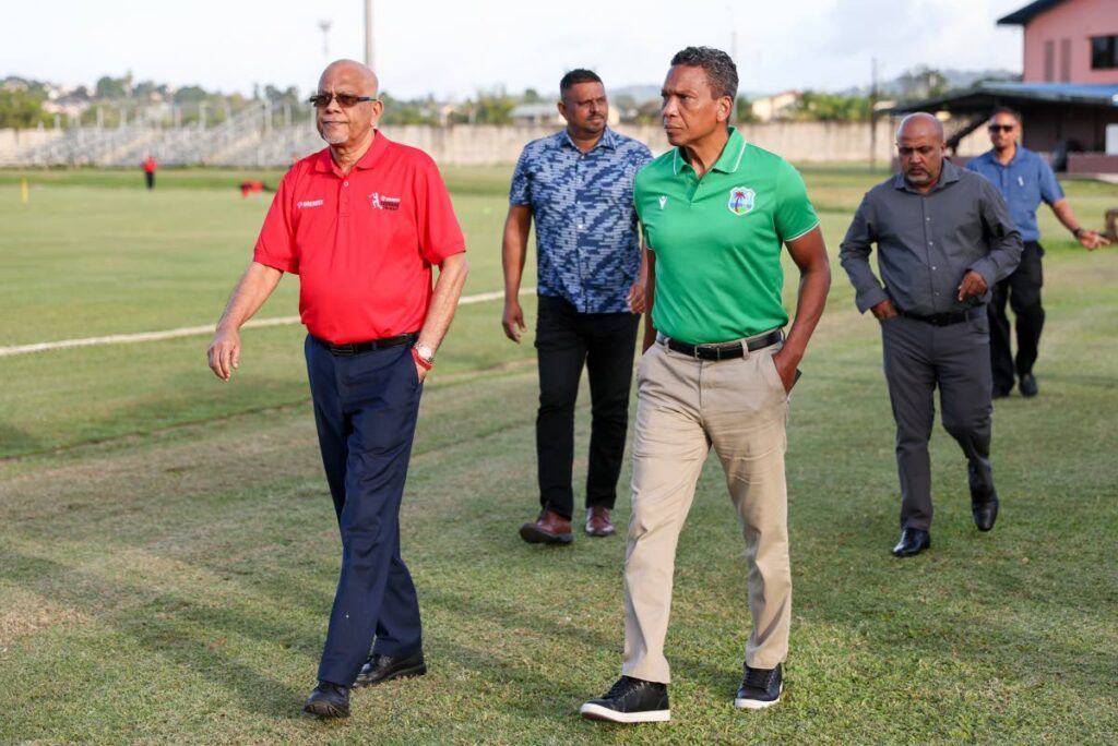 TTCB boss Azim Bassarath, front left, gives CWI CEO Chris Dehring, front right, a tour of the National Cricket Centre on February 10. - Photo courtesy TTCB