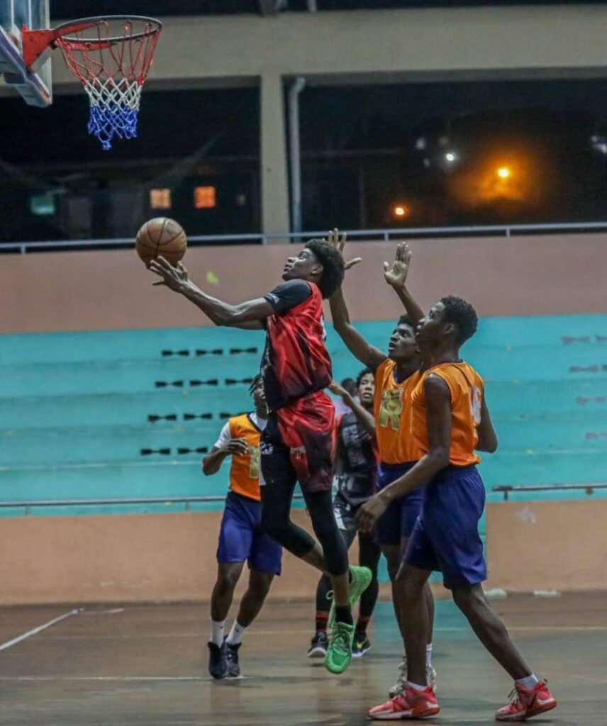 Spartans TT forward and under-17 MVP William Francis soars to the rim during the 2024/25 North Zone Revival invitational basketball tournament. - Photo courtesy Garvin Warwick 