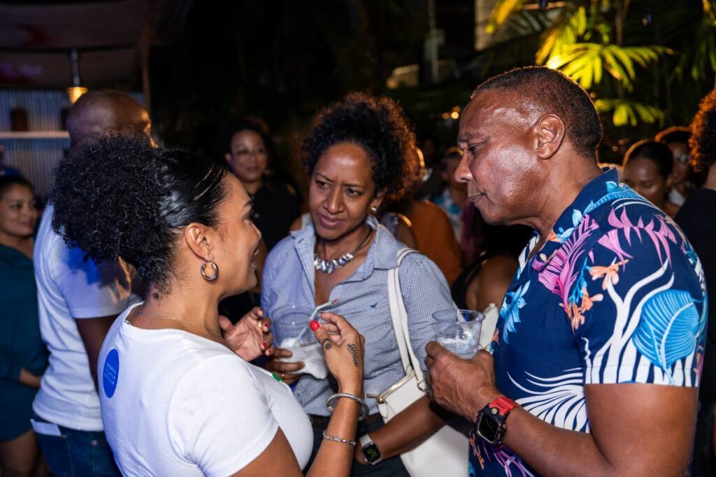 Asha Lovelace, from left, Riselle Ling, manager, Score Values and Gerry Noel, board member TT Trade and Investment Promotion Agency, at the launch of Caribbean Film Festival, Calabash Garden, Port of Spain on February 13. - Photo by Vishal Ramoudith 