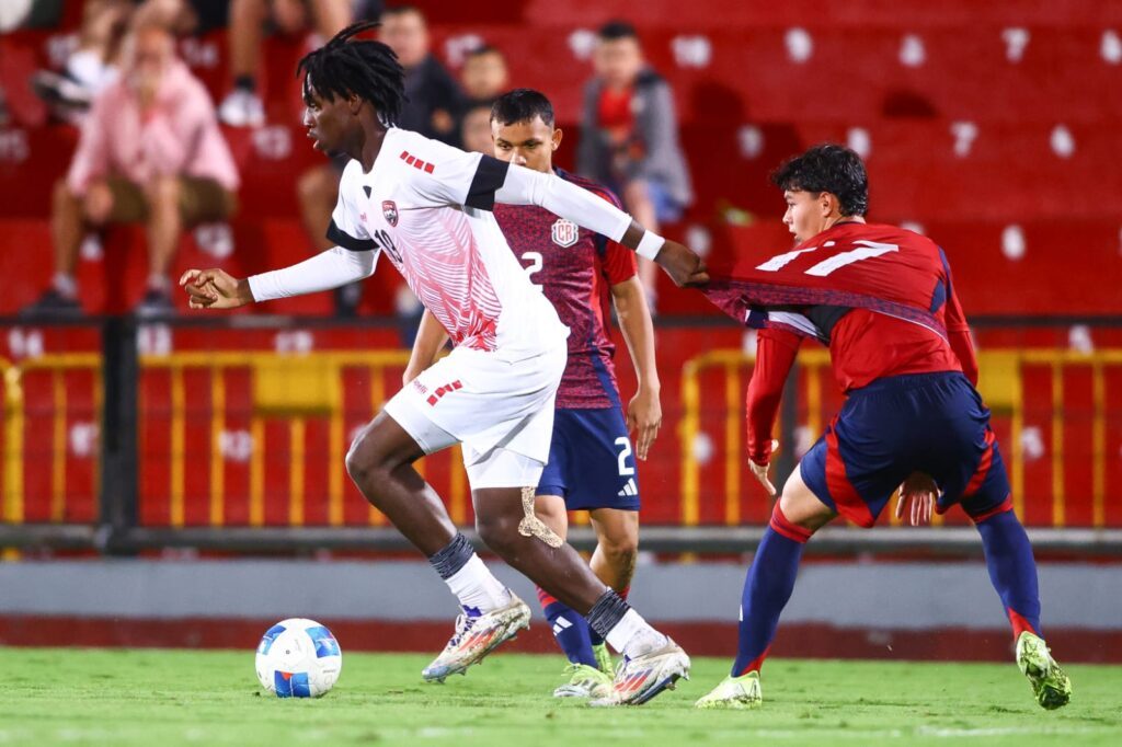 TT's Chaz Williams gets past his marker during their 2-0 loss to Costa Rica in their final Concacaf U17 Men's Qualifiers Group B match on Sunday. - Photo courtesy TTFA