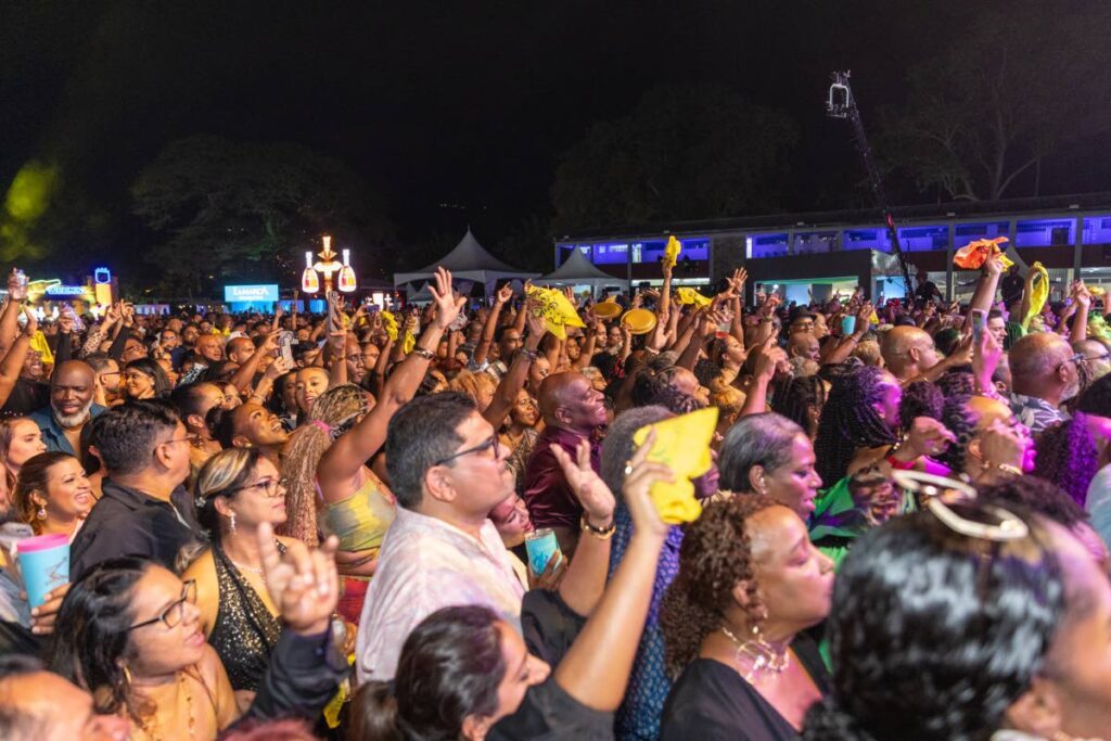 Patrons enyoy themselves at Fete Royal at Queen's Royal College. St Clair on February 15. - Photo by Daniel Prentice