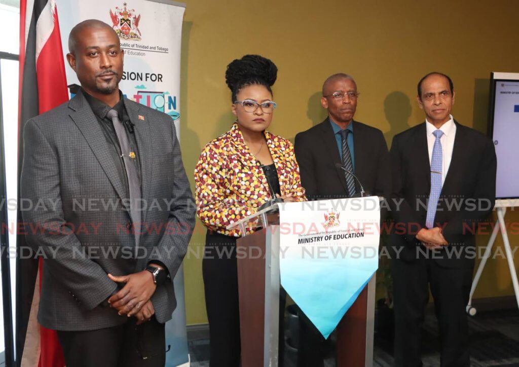 From left, Ministry of Education Information and Communications Technology Division Director Aldwin Webb, Minister of Education Nyan Gadsby-Dolly, chief education officer Peter Smith and school supervision director Aaron Ramrattan, at the launch of First Year Infant Registration System TT (FIRSTT), at the Ministry of Education, Port of Spain on February 17. - Photo by Angelo Marcelle