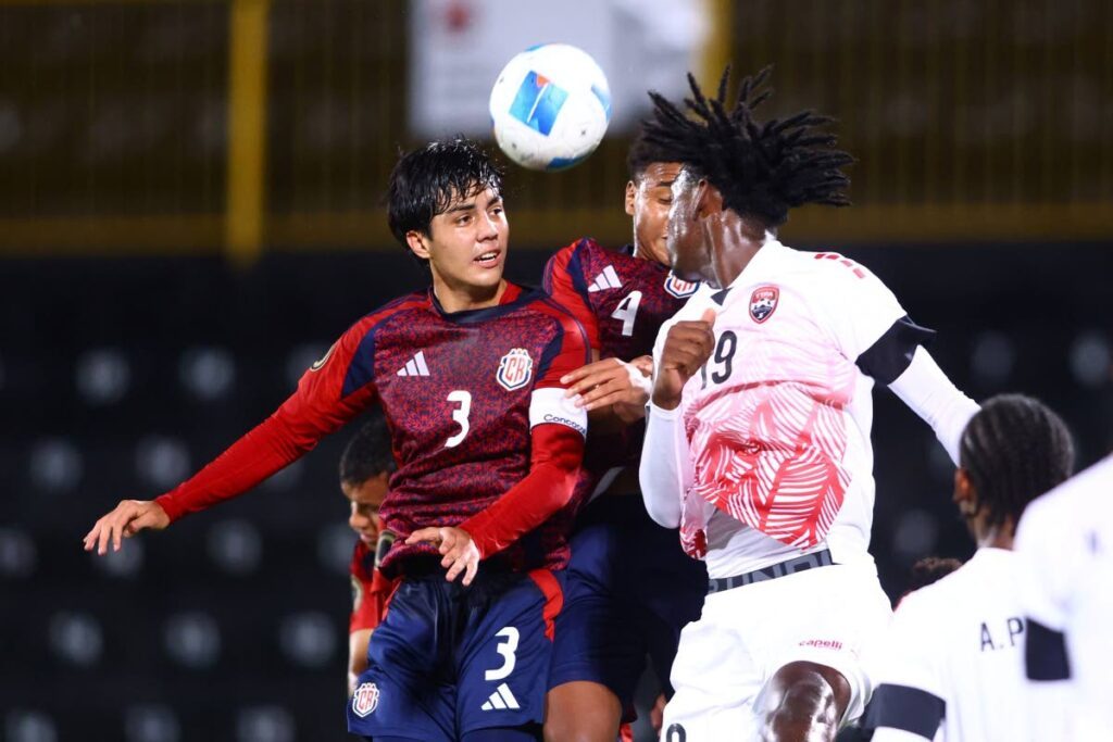 Trinidad and Tobago’s Josiah Kalicharan (R) jumps for a header during the Concacaf U17 World Cup Group B qualification match at the Estadio Alejandro Morera Soto in Alajuela, Costa Rica, on February 16, 2025. - Photo courtesy TTFA Media