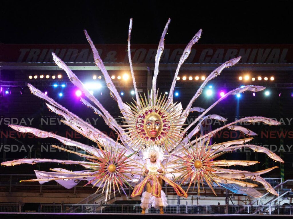 Laura Rampersad presents Queen Nefertiti and African Royals in the category creative topical at the NCC Senior Queen of Carnival competition  at the Queen's Park Savannah, Port of Spain, on February 19. - Photo by Faith Ayoung