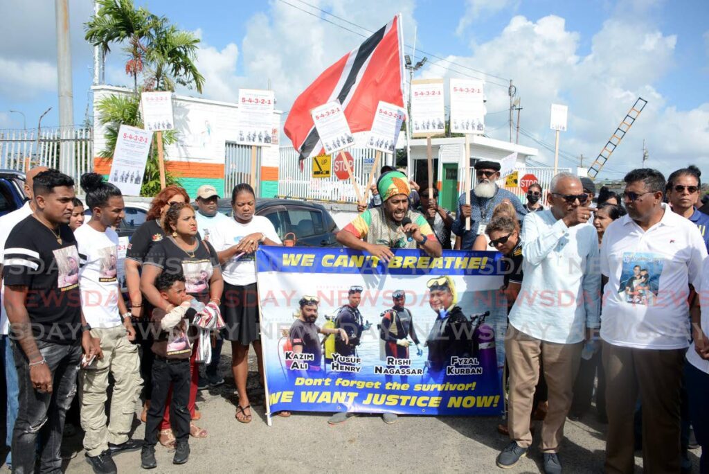 Some of the people who joined the Paria Justice Committee to commemorate the third anniversary of the Paria diving tragedy which claimed the lives of Kazim Ali Jr, Yusuf Henry, Rishi Nagassar and Fyzal Kurban at Point-a-Pierre on February 22. - Photo by Innis Francis