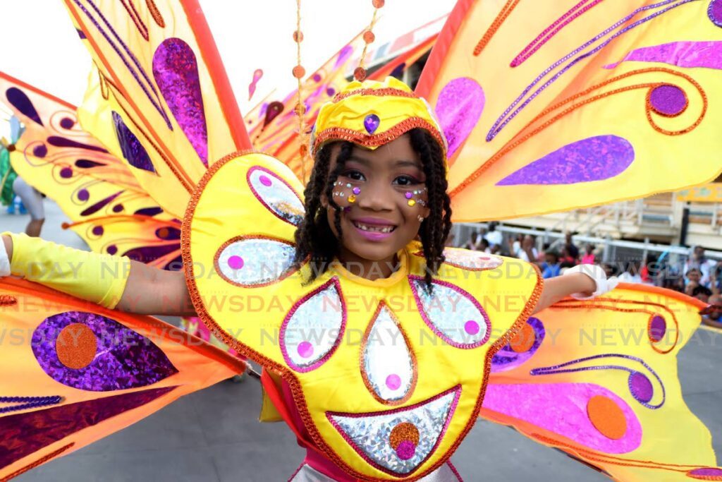 This little cutie from Classix Production portrays Papillon, a Tribute to Minshall during the TT Red Cross Children's Carnival parade. - Photo by Ayanna Kinsale