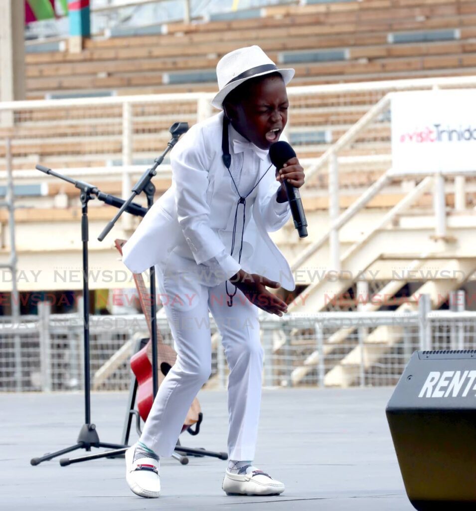 Xhaiden Darius of Savonetta Primary School sings Calypso Will Survive, to win the National Junior Calypso Monarch final at the Queen’s Park Savannah, Port of Spain, on February 24. - Photo by Angelo Marcelle