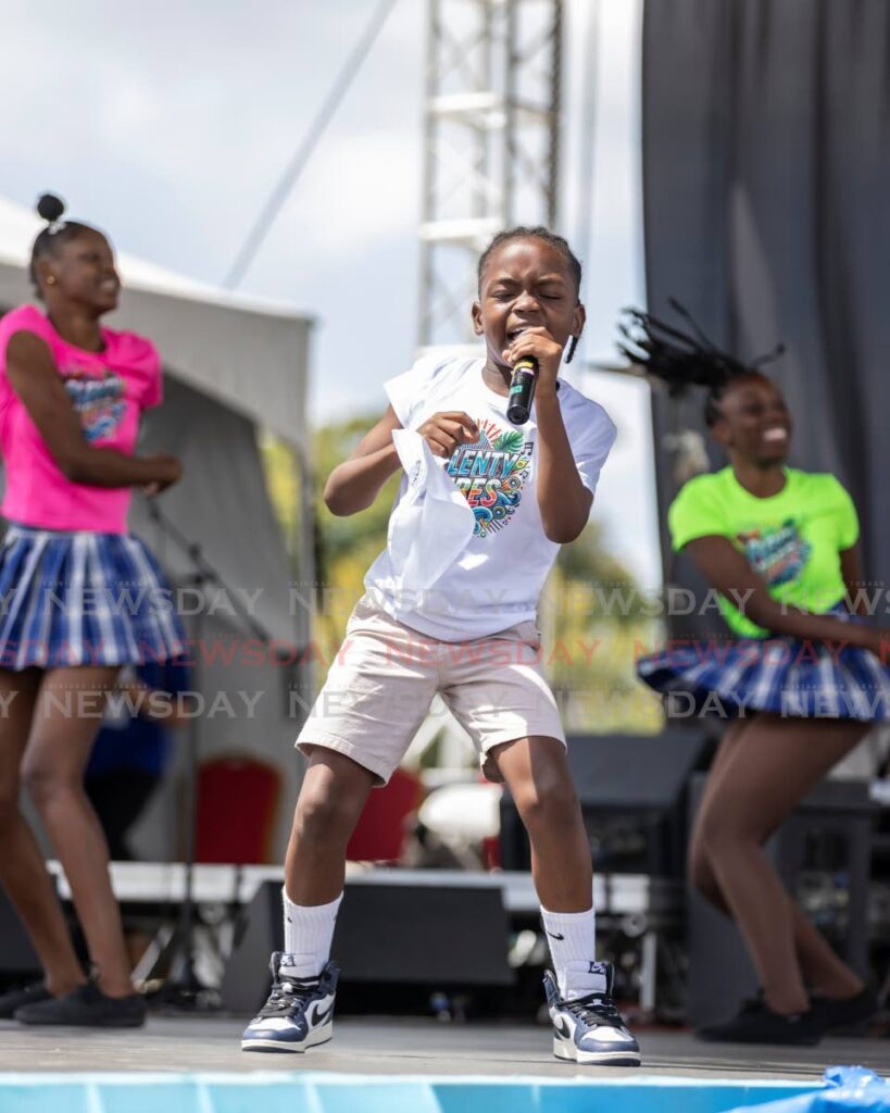 Xhaiden Darius competes in the Junior Soca Monarch competition at the John Cupid Carnival Village, Queen's Park Savannah, Port of Spain, on February 25. - Photo by Jeff K. Mayers