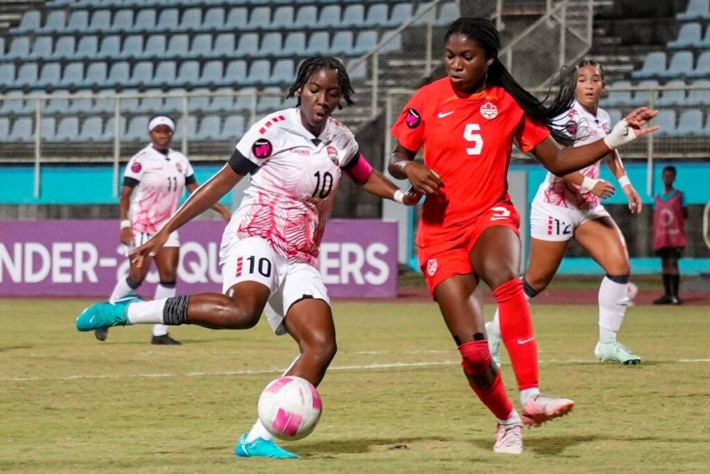 Trinidad and Tobago captain Orielle Martin (L) in action against Canada during the Under-20 Concacaf Women's qualifier match, on February 25, 2025, at the Ato Boldon Stadium, Couva. - Photo courtesy TTFA Media