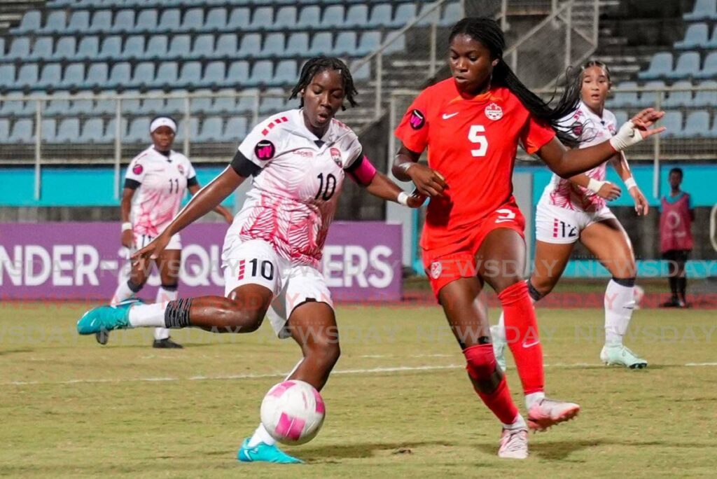 Trinidad and Tobago captain Orielle Martin (L) in action against Canada during the Under-20 Concacaf Women's qualifier match, on February 25, 2025, at the Ato Boldon Stadium, Couva. - TTFA Media