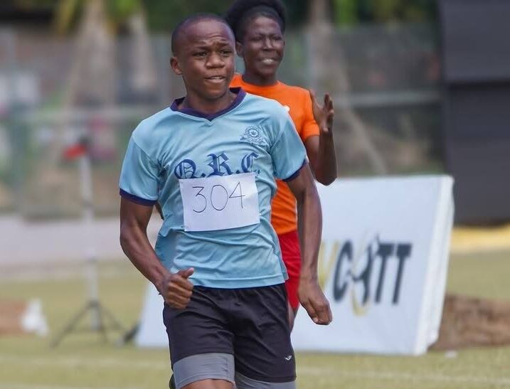 Push it to the limit: This Queen’s Royal College athlete makes big strides to the finish line during the fifth leg of the Keshorn Walcott Golden League Athletics series at the Diego Martin Sporting Complex on February 22. - Photo courtesy Keshorn Walcott Golden League’s Instagram page 