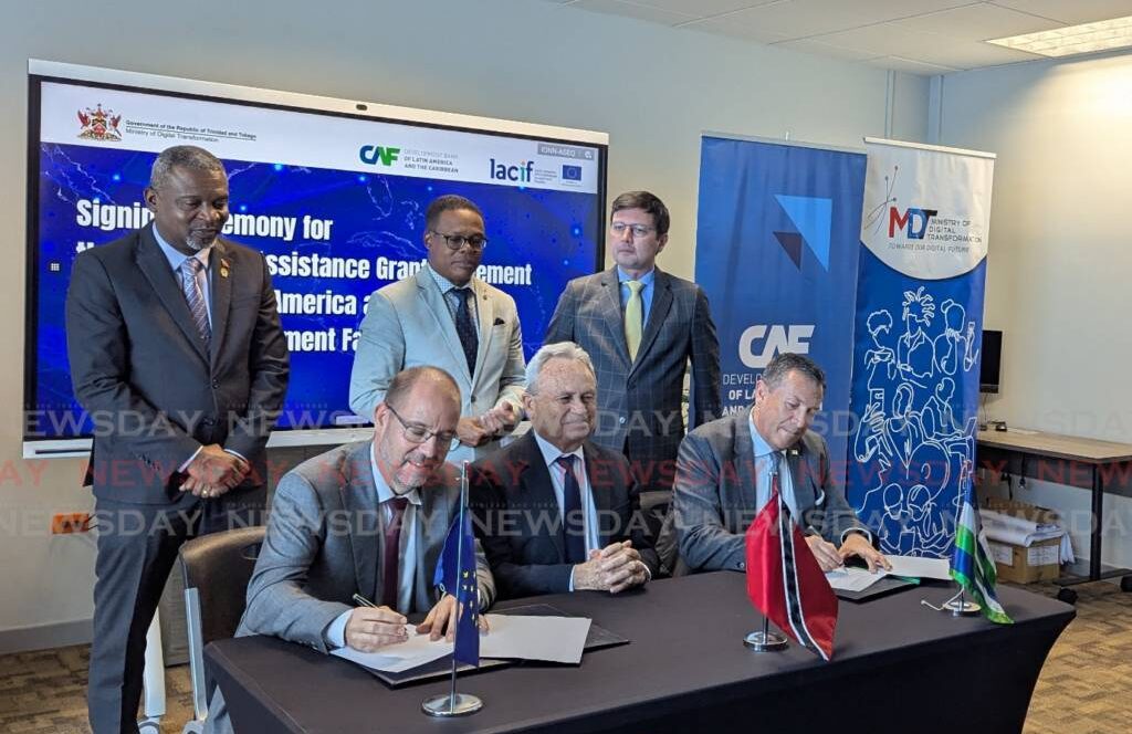 Seated from left, David Mogollón, head of co-operation of the EU to Caricom; Finance Minister Colm Imbert; and CAF representative to TT Bernardo Requena at the signing the LACIF grant agreement on Tuesday. Standing from left are Digital Transformation Minister Hassel Bacchus, Foreign and Caricom Affairs Minister Dr Amery Browne and CAF executive VP Gianpiero Leoncini. -