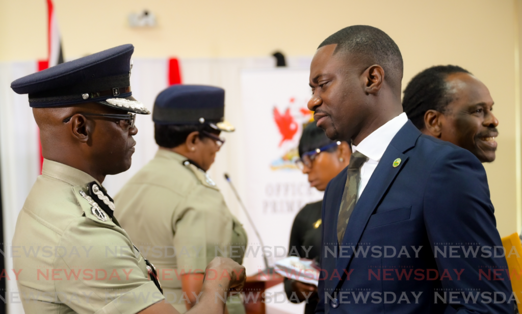 THA Chief Secretary Farley Augustine, right, chats with Deputy Commissioner of Police (Operations) Junior Benjamin at a post-National Security Council meeting news briefing at the Office of the Prime Minister, Central Administrative Services Tobago in Scarborough on July 9, 2024. - File photo by Visual Styles