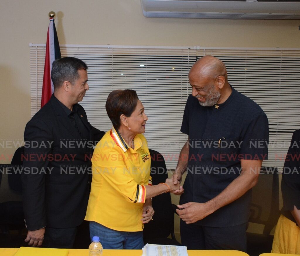 From left, PEP leader Phillip Edward Alexander looks on as UNC Political Leader Kamla Persad-Bissessar shakes hands with OWTU President General Ancel Roget at the press conference of coalition of leaders at the UNC Headquarters in Chaguanas on February 11. - Photo by Innis Francis