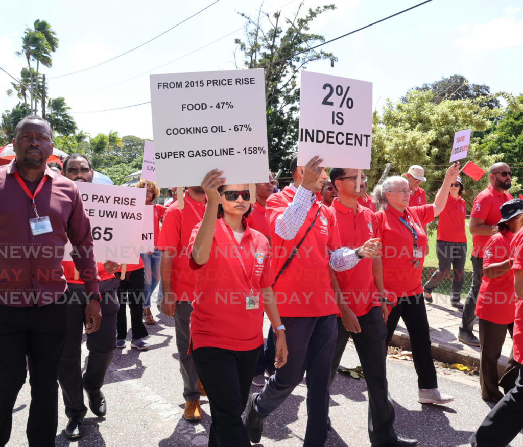 Members of the West Indies Group of University Teachers (WIGUT) protest at UWI, St Augustine on January 20. - Photo by Faith Ayoung