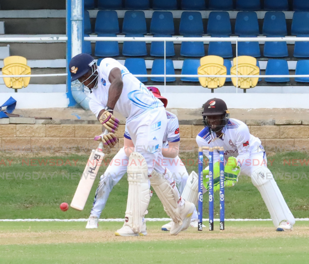 Philton Williams of Queen's Park Cricket Club plays a shot during his team's match against PowerGen in the National League at the Queen's Park Oval on February 9. - Photo by Angelo Marcelle