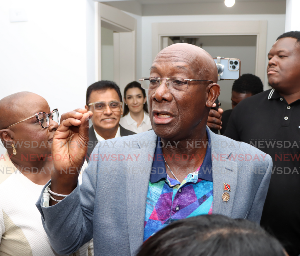 The Prime Minster Dr Keith Rowley speaks to media after a ribbon-cutting ceremony at the City Heights Housing Development, San Fernando on February 7. - Photo by Ayanna Kinsale