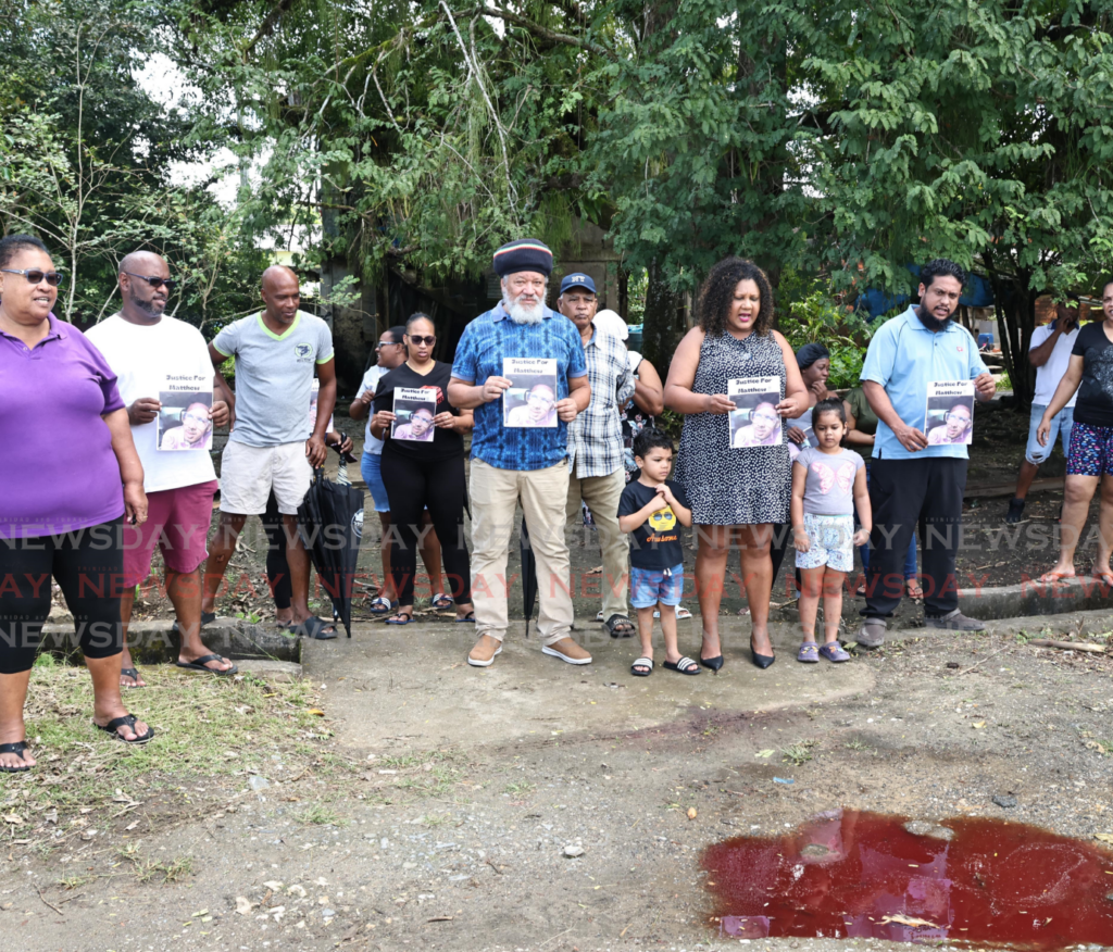 Tabaquite residents protest next to the spot Matthew Chancellor was shot dead on February 15. - Photo by Lincoln Holder