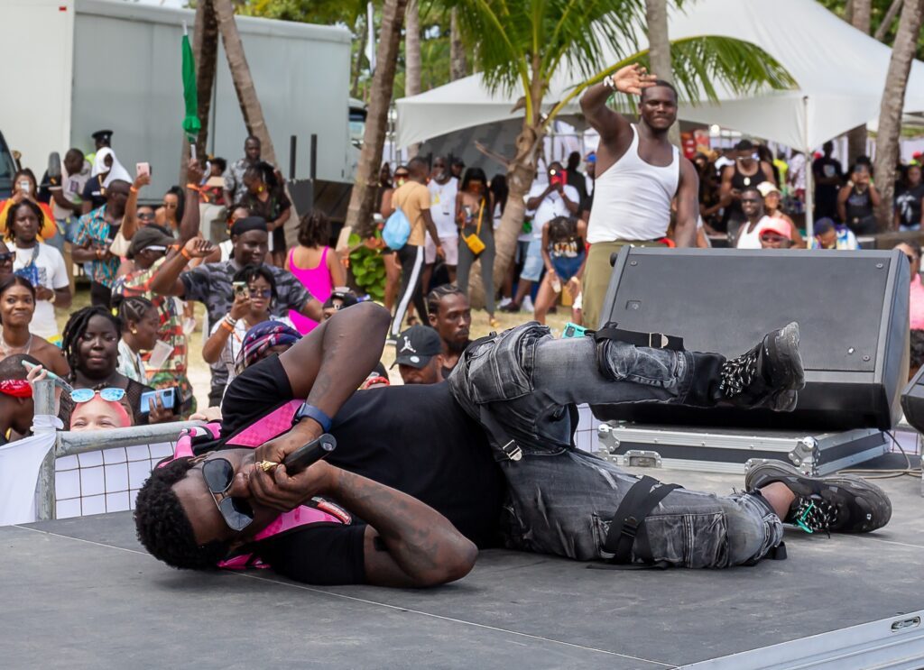 Trinidad Killa hits the ground as he performs one of his songs in this file photo. 