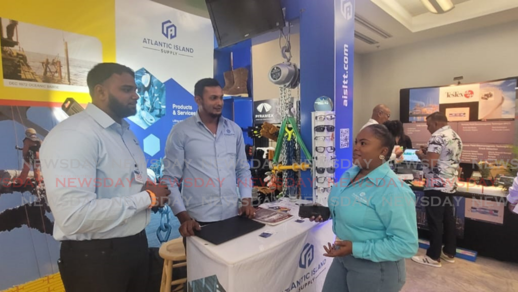 Sales representatives Renaldo Alfred, from left, and Ryan Gopie and HSEQ co-ordinator Jenelle Garrick of Atlantic Island Supply at the TT Energy Conference and Tradeshow 2025 at Hyatt Regency, Port of Spain on February 12. - Photos by Laurel Williams