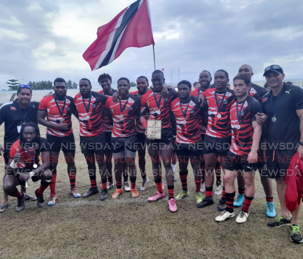 TT rugby men's players and staff celebrate their second-place finish at the 2024 Rugby Americas North Sevens tournament last November. - File photo by Roneil Walcott 