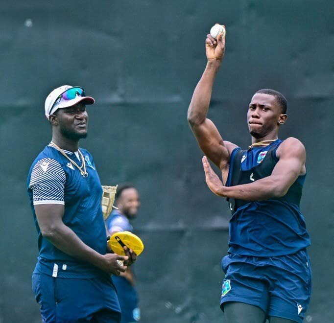 West Indies' pacer Shamar Joseph bowls as head coach Daren Sammy looks on during a practice session in Sri Lanka last year. - File photo