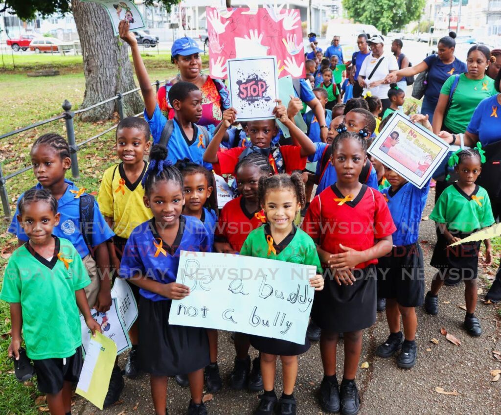 STOP BULLYING: Students of Tranquillity Government Primary School display their placards during a walk against bullying at the Queen’s Park Savannah, Port of Spain, on November 7, 2024.  - File photo by Ayanna Kinsale 