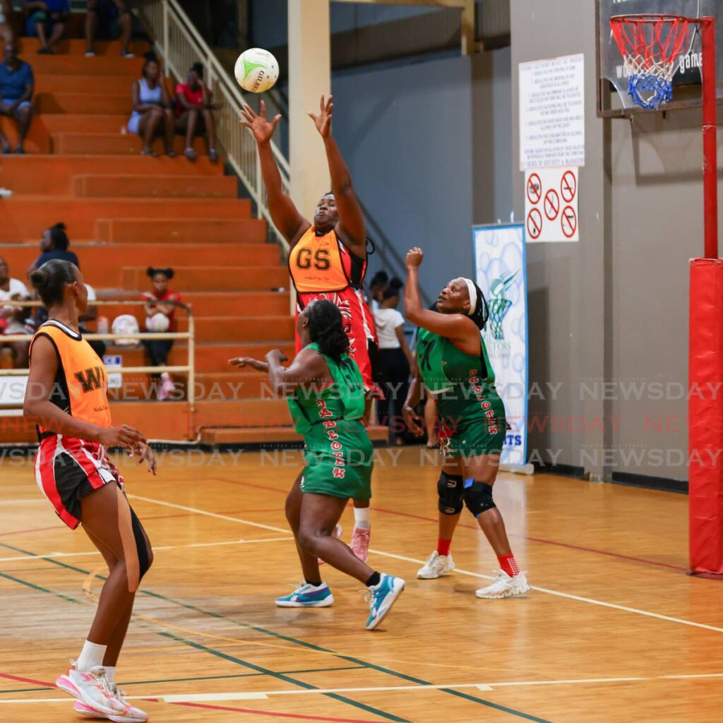 UTT GS Afiesha Noel jumps to catch a pass against Jabloteh during Courts All Sectors Netball Premiership league at the Eastern Regional Indoor Sports Arena on January 25, 2024 in Tacarigua, Trinidad. - File photo by Daniel Prentice