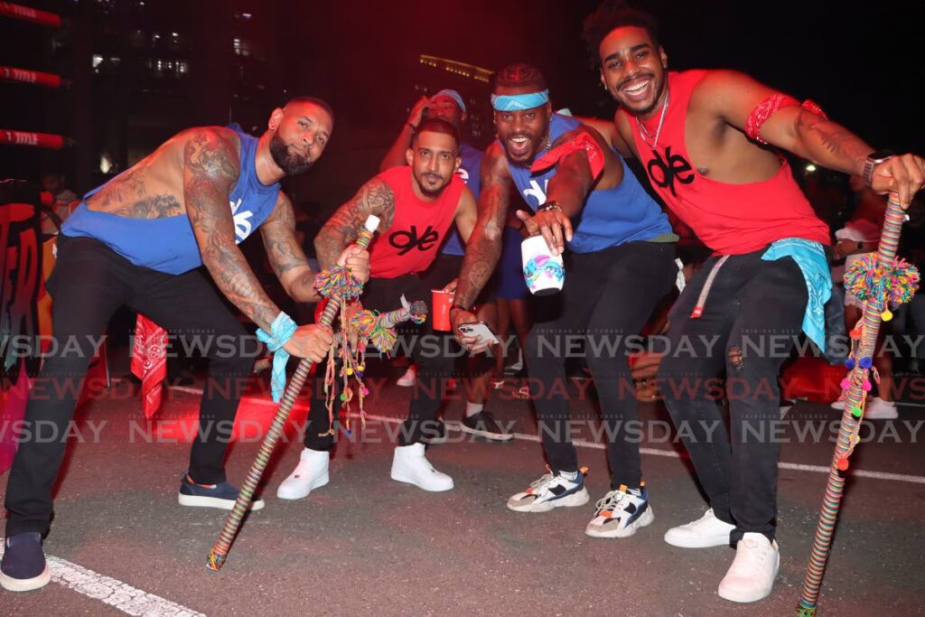 Stickfighters warm up at The Lost Tribe cooler fete. - Photos by Angelo Marcelle