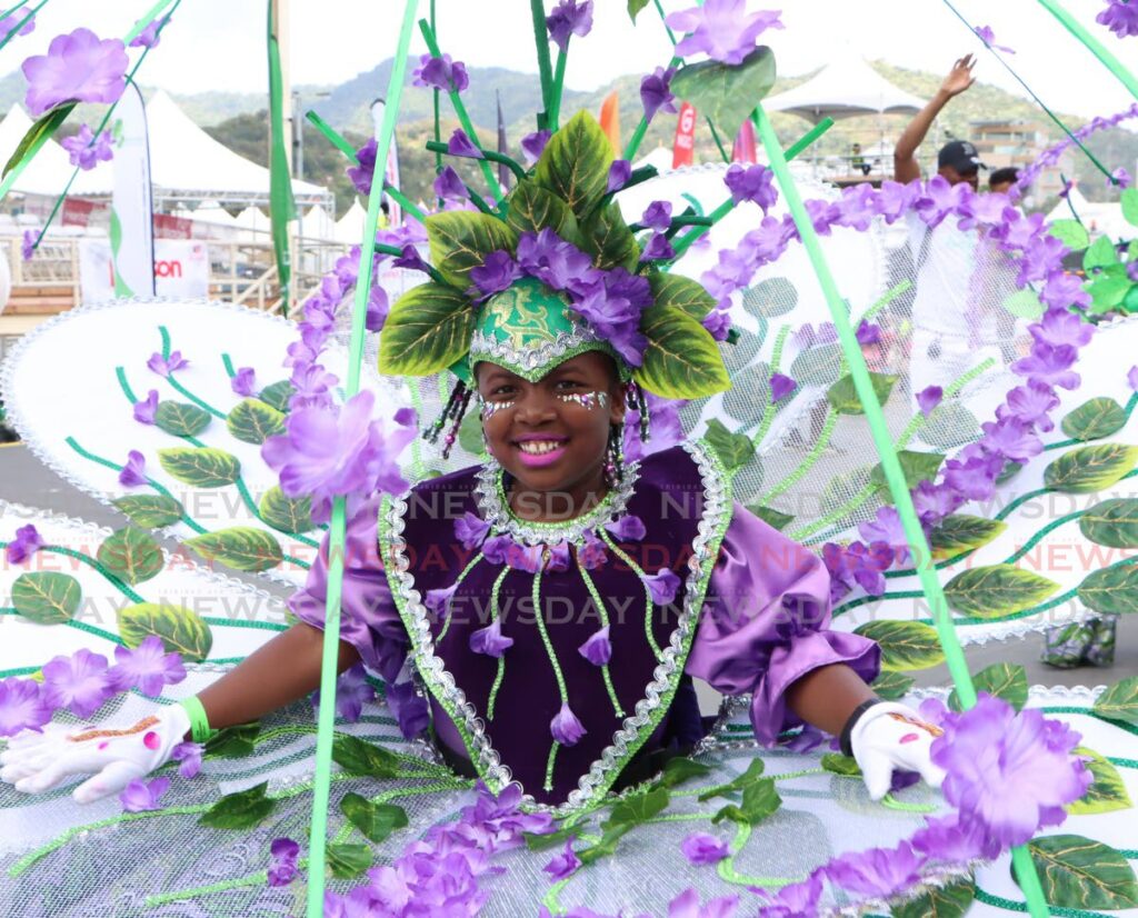 A masquerader from Coco-Lily Productions which portrayed Trini Bush Medicine Vervine, at Kiddies Carnival, Queen's Park Savannah on March 1. - Photo by Angelo Marcelle