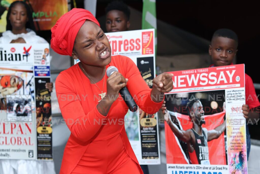 Alaeja Gould-Ferguson sings Fix Your Front Page at the Chaguanas Junior Calypso Monarch competition at Ramsaran Street, Chaguanas, on March 1. Gould-Ferguson took first place with 260 points. - Photo by Grevic Alvarado