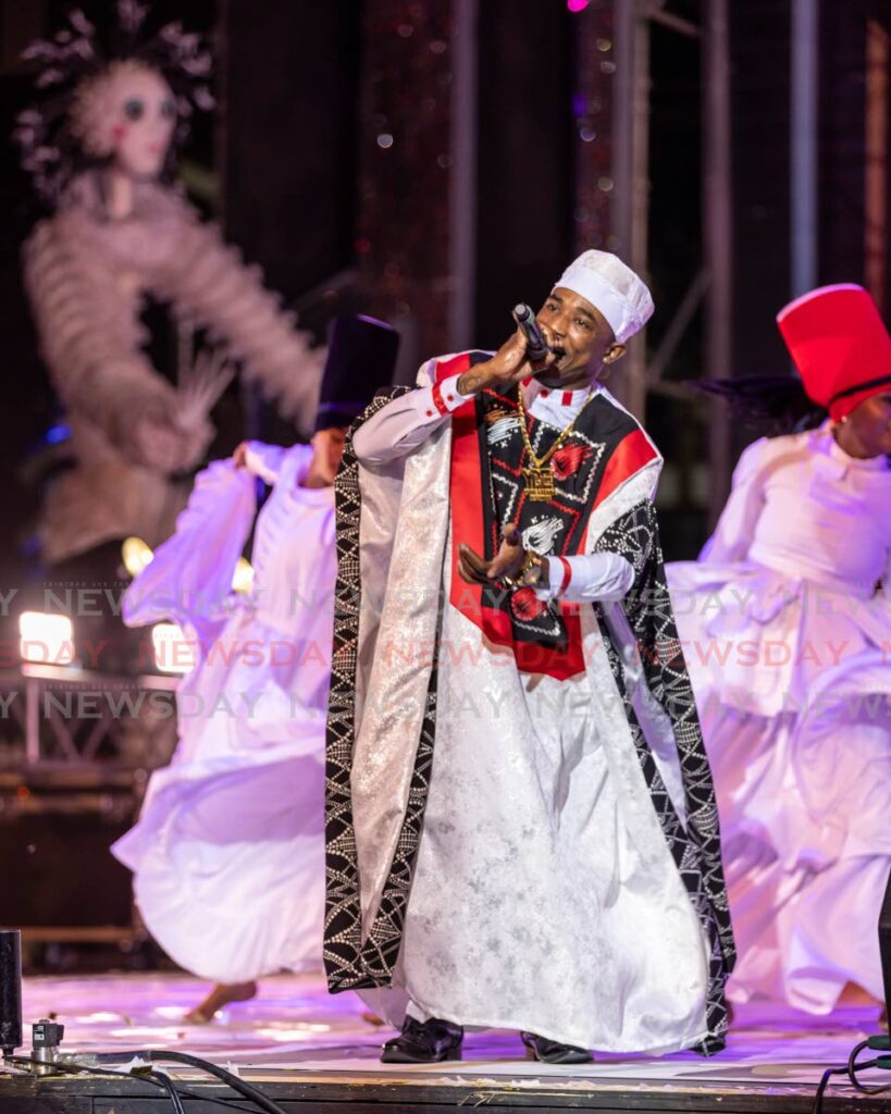 Yung Bredda (Akhenaton Lewis) during his performance of We Rise at Dimanche Gras at the Queens' Park Savannah, Port of Spain on March 2.  - Photo by Jeff K. Mayers