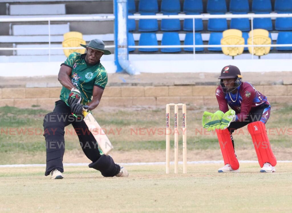 Prisons Sports Club batsman Jerve Cummings smashes the ball for six runs during the CPL/TKR T20 Festival match against Powergen, on March 7 at the Queen's Park Oval, St Clair.  - Photo by Angelo Marcelle