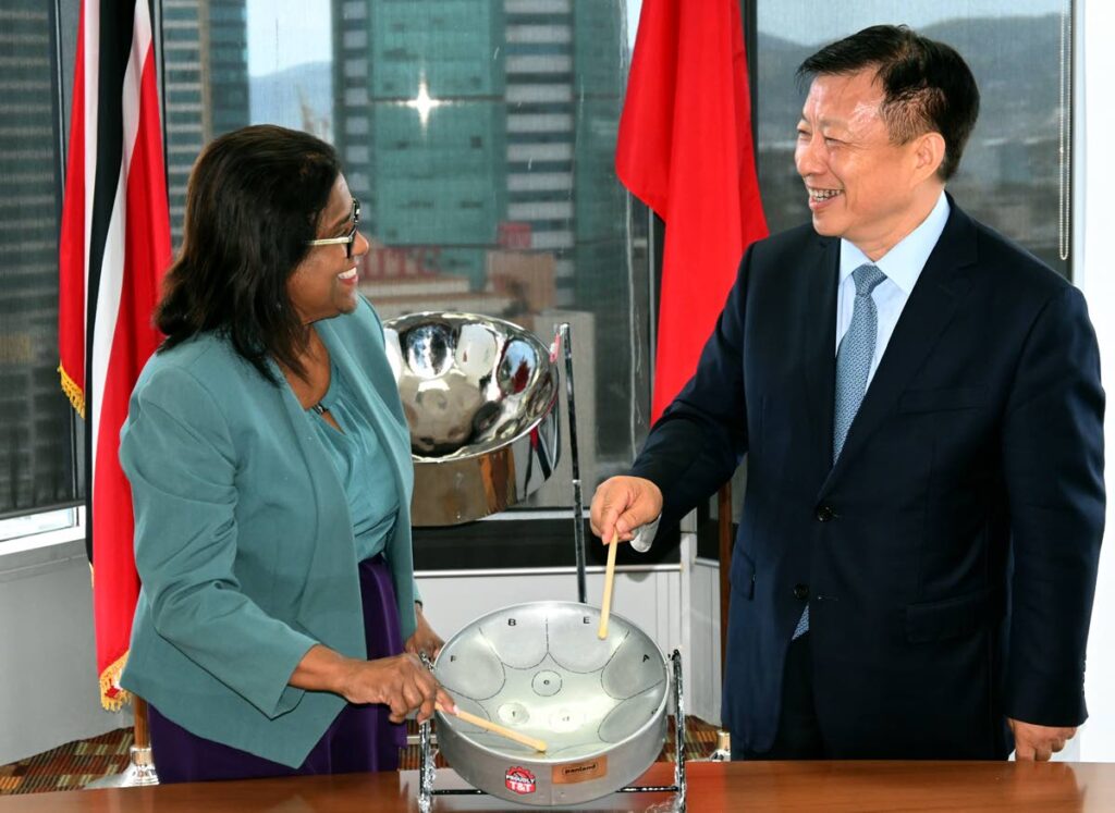 Vice Governor of Jiangsu Province Fang Wei, right, with Minister of Trade Paula Gopee-Scoon during a visit recently. - 