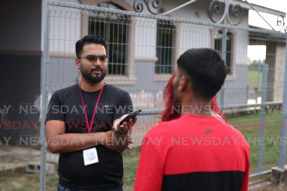 The son of murdered butcher Faizool Alladin speaks to the media in Spur Trace, Debe, on March 9. -  Photos by Jeff K Mayers