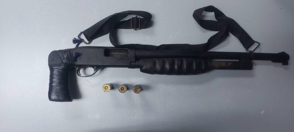 ILLEGAL: A shotgun and cartridges seized by police over the weekend. - Photo courtesy TTPS