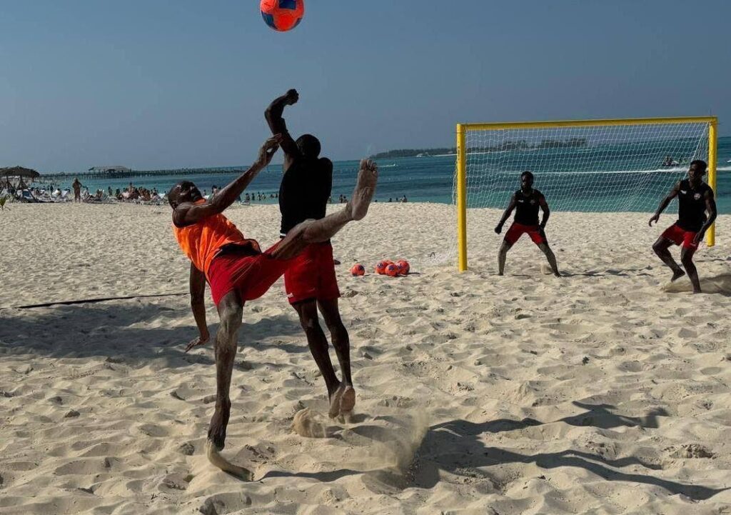 Kevon Woodley attempts a bicycle kick during a training session at Breezes Resort in Bahamas. TT were preparing for the 2025 Concacaf Beach Soccer Championships, which will be played at the Malcolm Park Beach Soccer Facility in Nassau, Bahamas from March 11-16. - Photo courtesy TTFA Media 