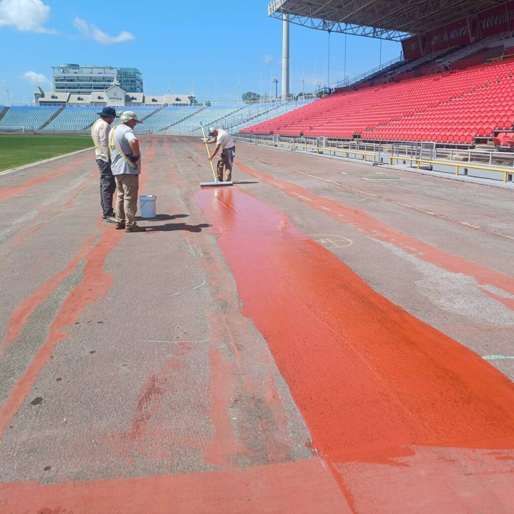 Workers refurbish the track at the Hasely Crawford Stadium in Mucurapo. - Photo courtesy SPORTT Facebook page  