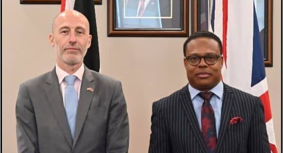 Foreign and Caricom Affairs Minister Dr Amery Browne, right, and UK High Commissioner to TT Jon Dean after a meeting at the ministry on March 14. - 