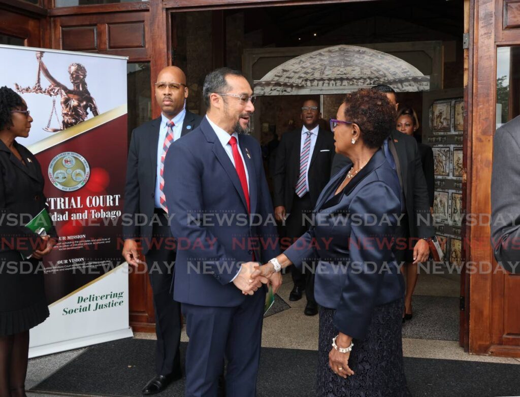 Prime Minister Stuart Young and president of the Industrial Court Heather Seale chat after a service at the Parish of the Assumption, Maraval, on March 20 to mark the 60th anniversary of the Industrial Court.  - Photo by Faith Ayoung