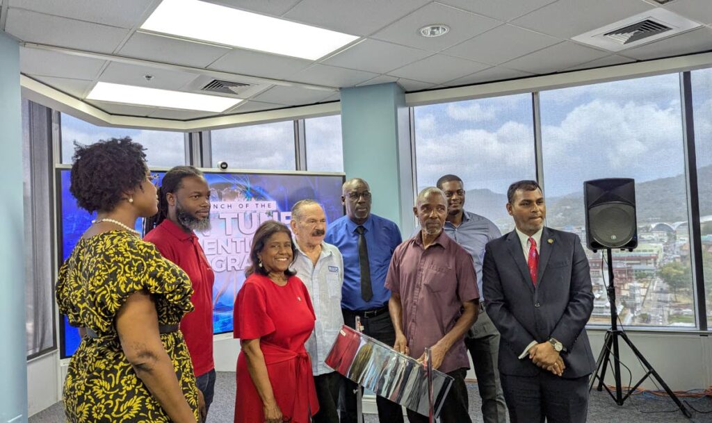 Trade Minister Paula Gopee-Scoon, centre, at the launch of the Pan Tuner Apprenticeship Programme on March 21. - Photo by Mya Quamie