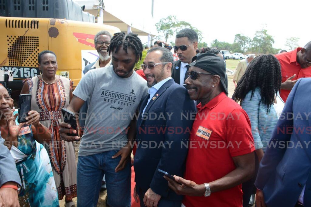 SELFIE WITH STUART: Prime Minister Stuart Young takes a photo with a La Brea resident after the opening of the La Brea Community Centre on March 21.  - Photo by Innis Francis