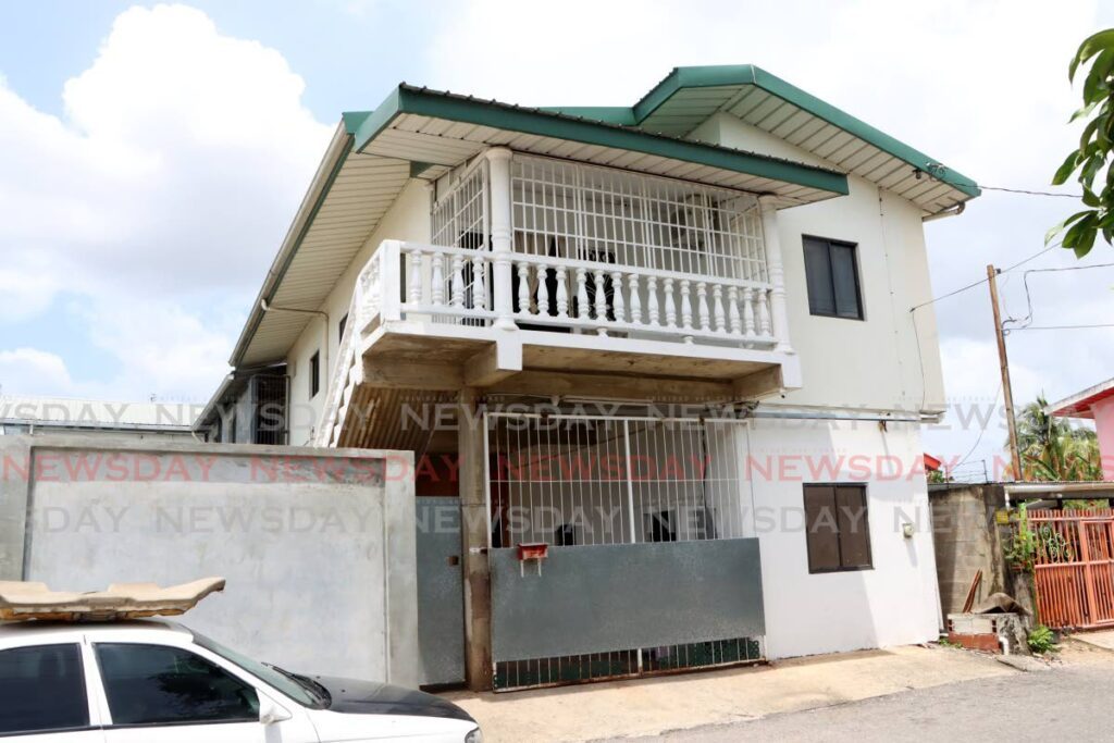 The house in Bamboo No 3 where Paul Bacchus and his girlfriend Andraz Rodriguez were killed in a police-involved shooting on March 20.  - Photo by Angelo Marcelle