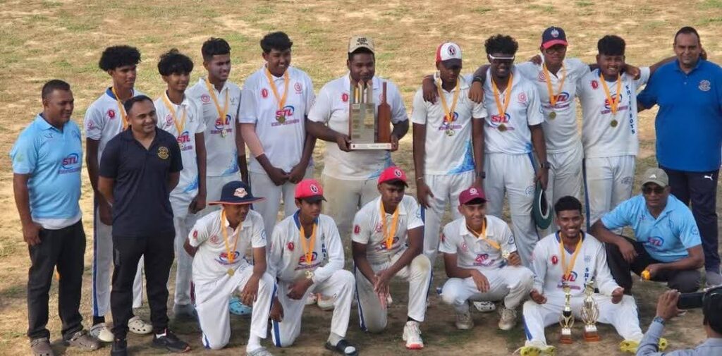 Shiva Boys Hindu College players and staff celebrate winning the SSCL championship title on March 21. - Photo courtesy Shiva Boys Hindu College's Facebook page